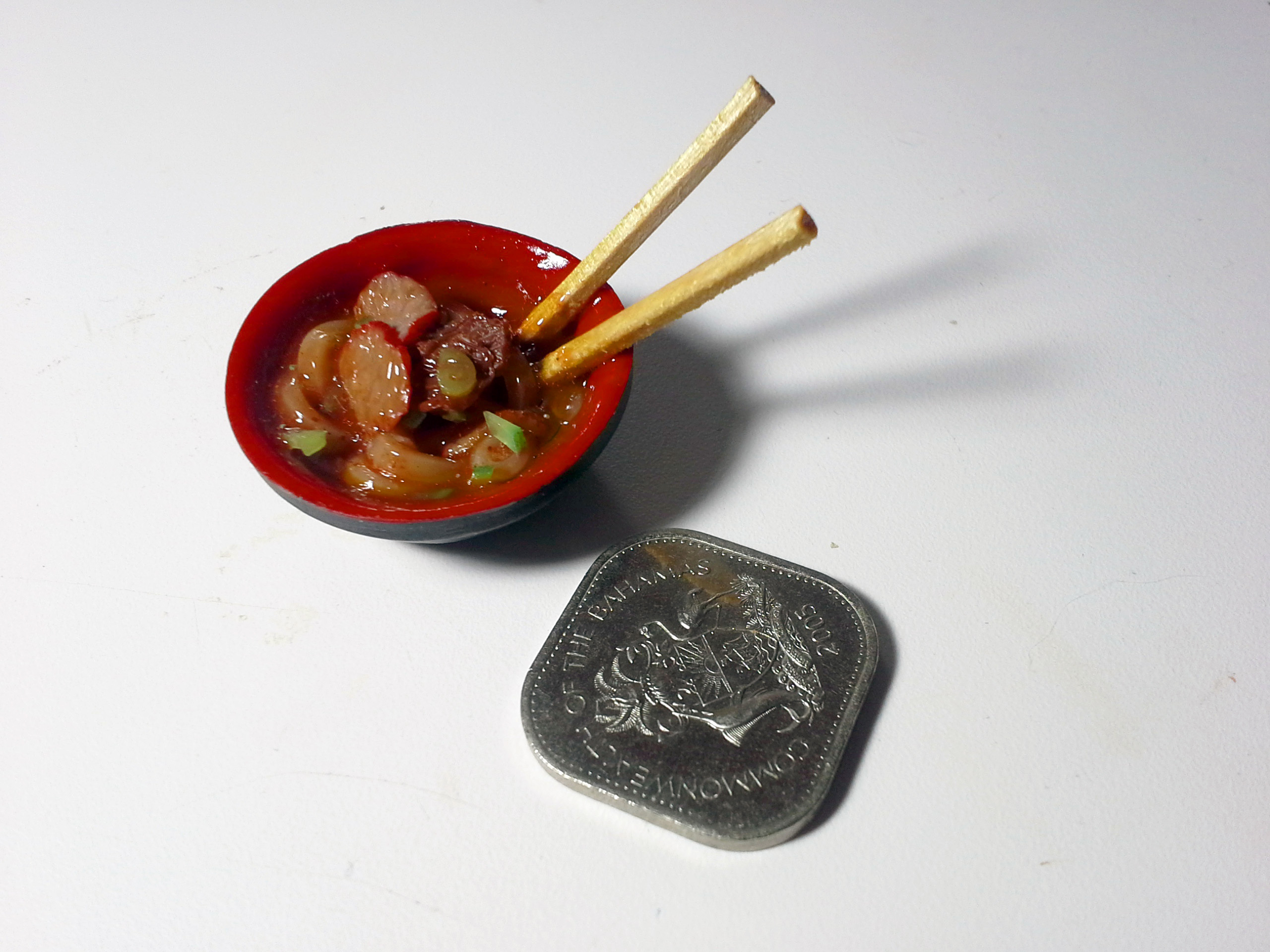 Miniature pork and beef udon soup